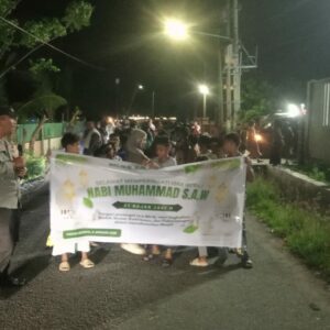 Bhabinkamtibmas Benete Hadiri Pawai Sholawat Peringatan Isra Mi’raj Nabi Muhammad SAW