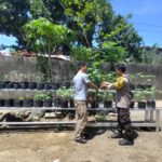 Bhabinkamtibmas Dampingi Warga Desa Bengkel Kelola Lahan Produktif