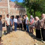 **Bhabinkamtibmas Desa Lamusung Dampingi Monitoring Pembangunan RTLH, Wujud Sinergi Warga dan Pemerintah**