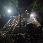 Di Bawah Cahaya Malam, Satgas Garuda Bangun Harapan