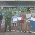Babinsa Amankan Lomba Renang, Semangat Atlet Muda Warnai HUT Ke-132 Desa Batu Kumbung