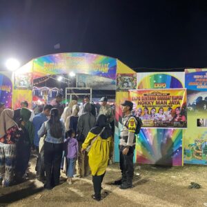 Bhabinkamtibmas Desa Ta’a Laksanakan Pengamanan Pasar Malam, Ajak Masyarakat Jaga Kamtibmas
