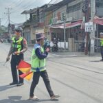 Polsek Gangga Gelar Kegiatan “Rawan Siang” di Jalan Raya Gangga – Bayan