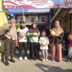 Bhabinkamtibmas Desa Teros Kawal dan Amankan Jalan Sehat Semarak HUT ke-81 Kemerdekaan RI
