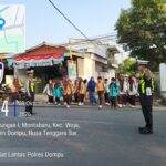 Sat Lantas Polres Dompu Gelar Strong Point Pagi, Wujudkan Kelancaran Lalu Lintas dan Keselamatan Pengguna Jalan