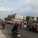 Sinergitas Tiga Pilar Kawal Suksesnya MTQH, Polsek Lape Amankan Pawai Ta’aruf di Desa Lopok